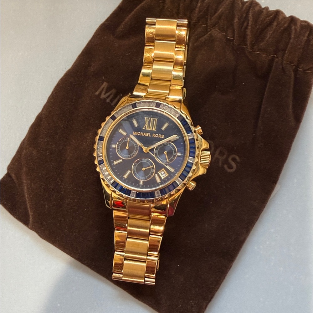 Michael Kors Gold Tone Watch with Blue Dial and Crystal Accents